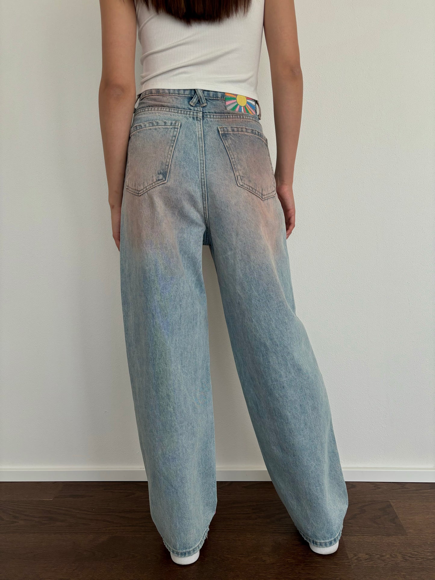 Washed pink wide leg jeans