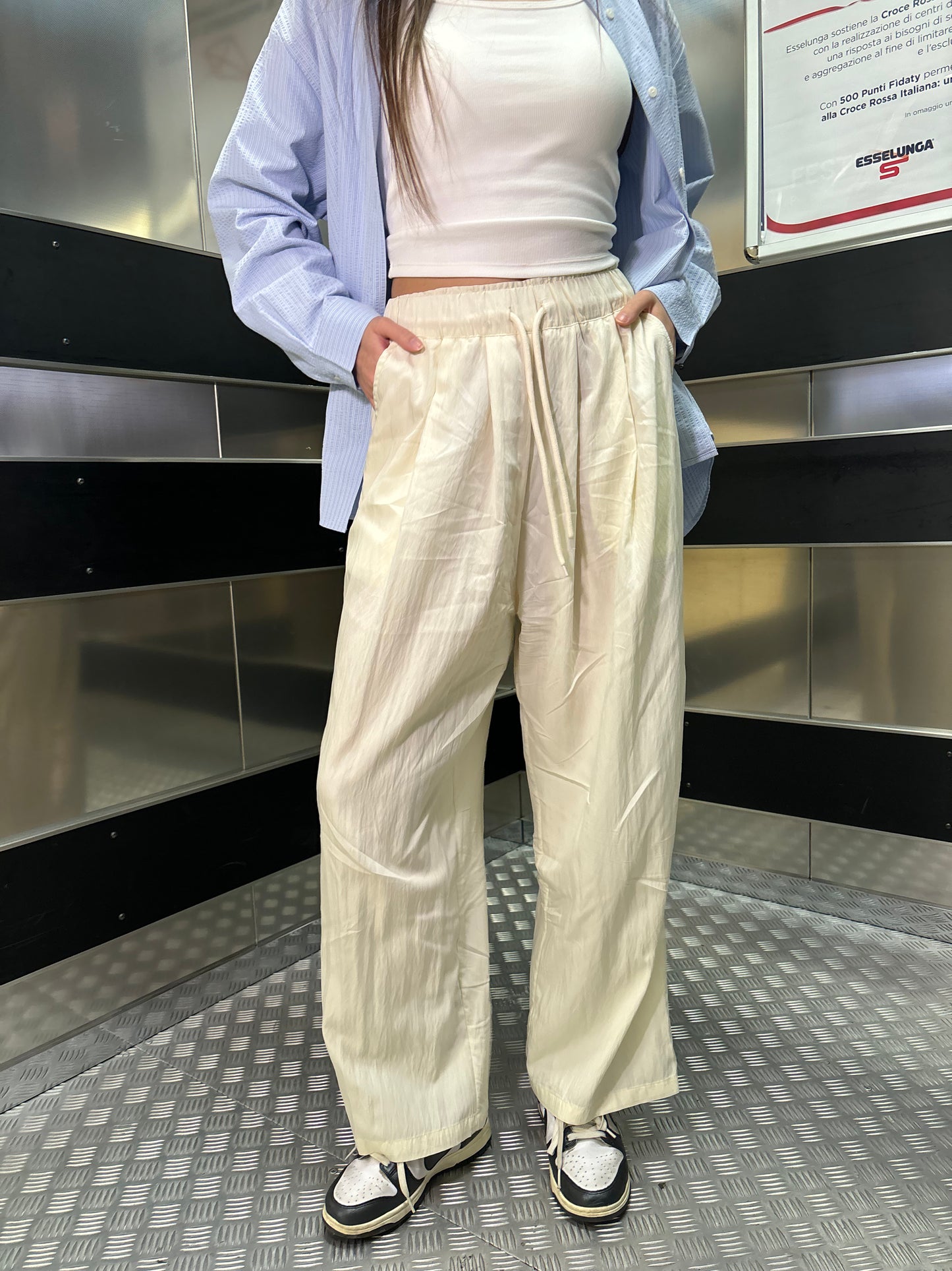 Wide fit trousers with drawstring